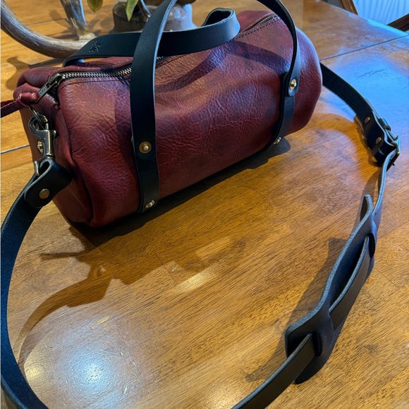 Go Forth Goods: Stylish Wine Bison Jane bag: Dimensions 6” circle 12” wide.